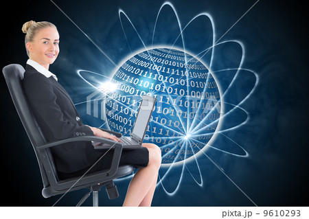 Composite image of businesswoman sitting on swivel chair with la 9610293
