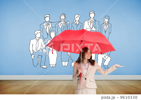 Composite image of attractive businesswoman holding red umbrella 9610330