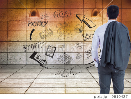 Composite image of businessman standing 9610427