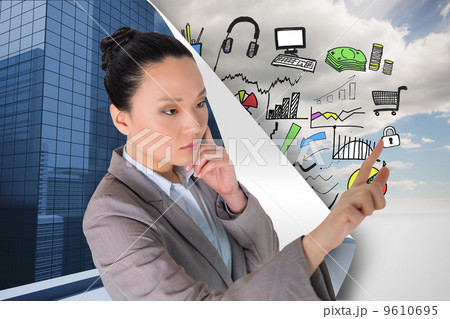 Composite image of thoughtful asian businesswoman pointing Composite image of thoughtful asian businesswoman pointing 9610695