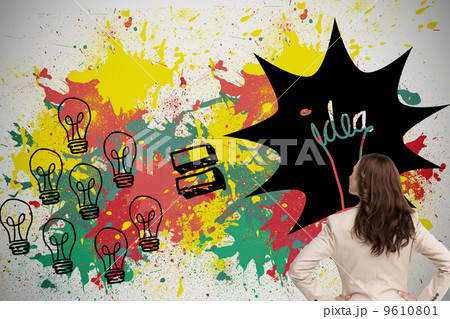 Composite image of businesswoman standing back to camera 9610801