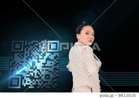Composite image of unsmiling asian businesswoman pointing Composite image of unsmiling asian businesswoman pointing 9613010