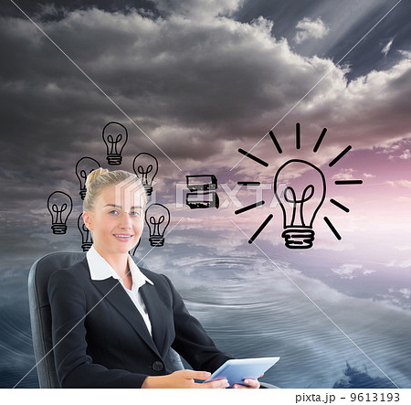 Composite image of businesswoman sitting on swivel chair with ta Composite image of businesswoman sitting on swivel chair with ta 9613193