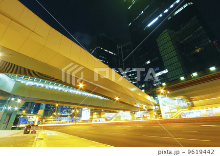 Modern urban landscape and the bustling streets in the evening 9619442