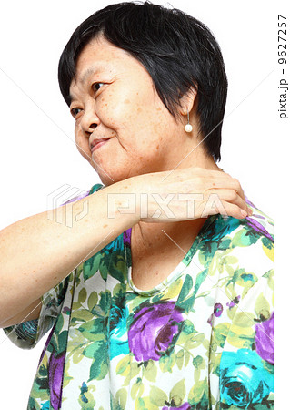 senior woman holding her aching back senior woman holding her aching back 9627257