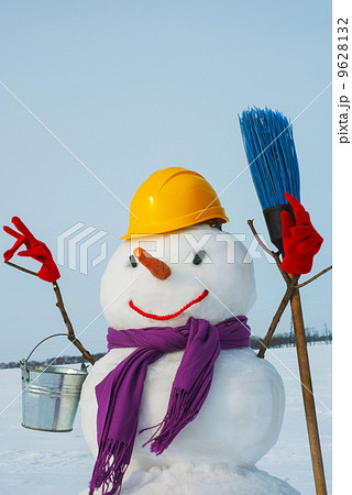 Lonely snowman at a snowy field Lonely snowman at a snowy field 9628132