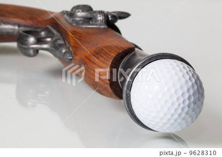 Old gun and golf ball Old gun and golf ball 9628310