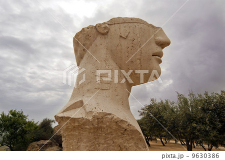 The statue in the archeological area of Agrigento, Sicily, Italy The statue in the archeological area of Agrigento, Sicily, Italy 9630386