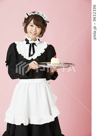 Maid To Offer Cake Stock Photo