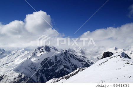 Panoramic view on ski resort Dombay in nice sun day Panoramic view on ski resort Dombay in nice sun day 9641355