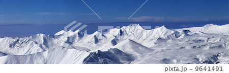 Panoramic view on off-piste slope and snowy plateau at nice day Panoramic view on off-piste slope and snowy plateau at nice day 9641491