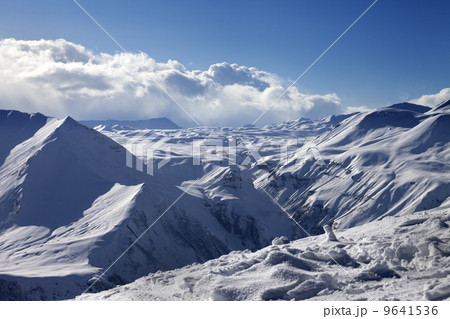 Speed flying in sunny winter mountains Speed flying in sunny winter mountains 9641536