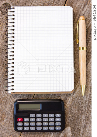 Notebook, pen and calculator 9641804