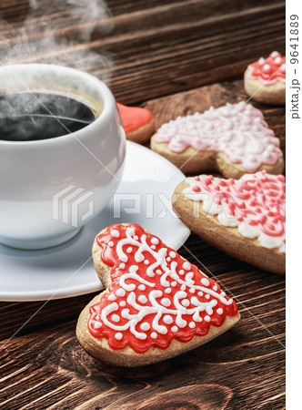 cookies baked on valentines day and a cup of coffee cookies baked on valentines day and a cup of coffee 9641889