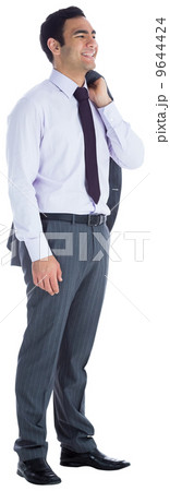 Smiling businessman standing 9644424
