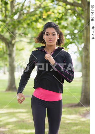 Portrait of a beautiful healthy young woman in the park Portrait of a beautiful healthy young woman in the park 9644749