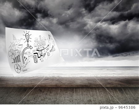 Sheet with graphics over sky on wall Sheet with graphics over sky on wall 9645386