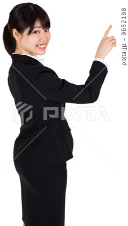 Smiling businesswoman pointing Smiling businesswoman pointing 9652198