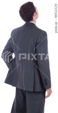 Businessman standing with hand on hip Businessman standing with hand on hip 9652229