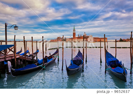 Gondolas and San Giorgio Maggiore church in Venice. 9652637