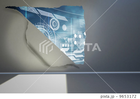 Rip on wall showing technology interface 9653172