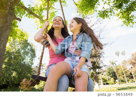 Happy mother and daughter on swing Happy mother and daughter on swing 9653849