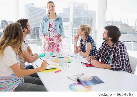 Casual business people in office at presentation 9654567
