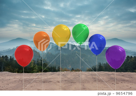 Balloons in front of mountains 9654796