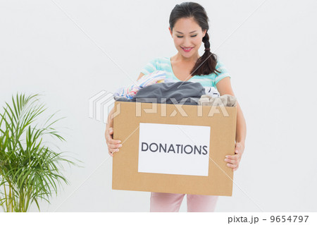 Woman with clothes donation 9654797