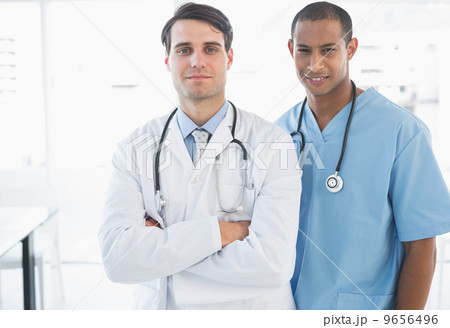 Confident doctors standing together in the hospital Confident doctors standing together in the hospital 9656496