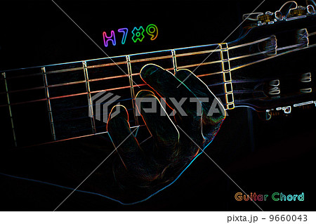 Guitar chord on a dark background 9660043