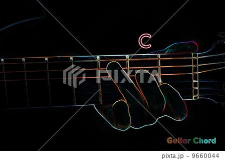 Guitar chord on a dark background 9660044
