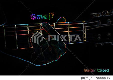 Guitar chord on a dark background 9660045
