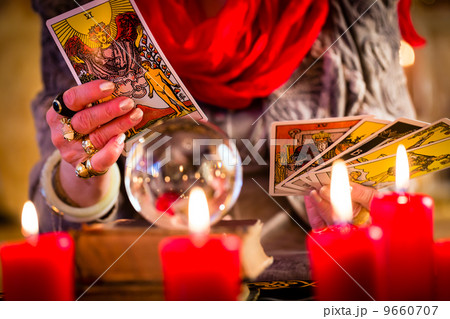 fortuneteller during Session with tarot cards fortuneteller during Session with tarot cards 9660707