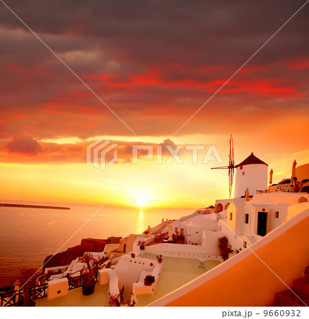 Santorini island with windmills in Greece 9660932
