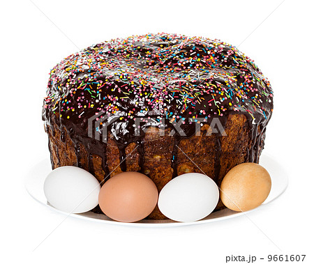 Easter cake with glace icing and easter eggs on white background 9661607