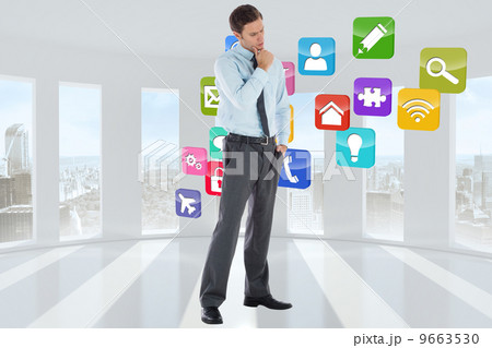 Composite image of thoughtful businessman with hand on chin 9663530