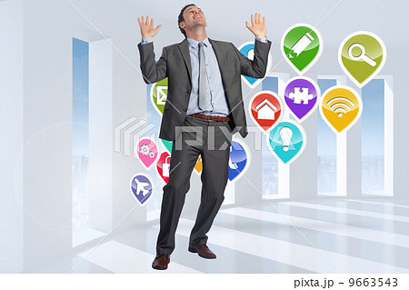 Composite image of businessman posing with arms raised Composite image of businessman posing with arms raised 9663543