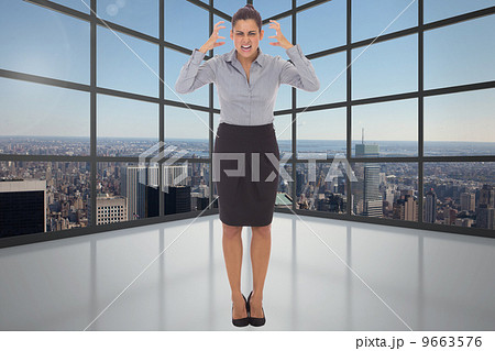 Composite image of frustrated businesswoman shouting Composite image of frustrated businesswoman shouting 9663576