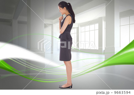 Composite image of thoughtful businesswoman 9663594