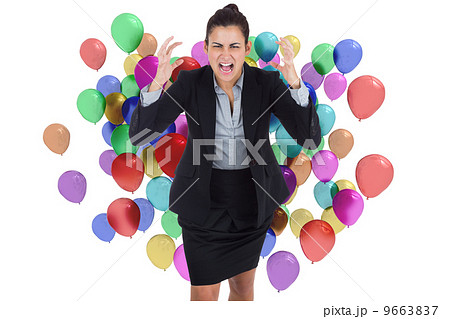 Composite image of angry businesswoman gesturing 9663837
