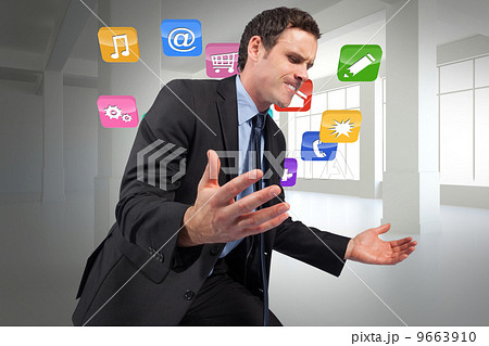 Composite image of businessman posing with arms out 9663910