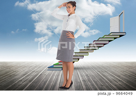 Composite image of smiling thoughtful businesswoman Composite image of smiling thoughtful businesswoman 9664049