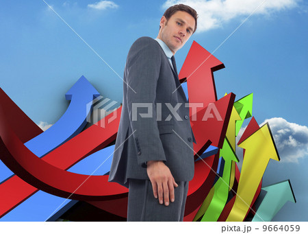 Composite image of stern businessman standing Composite image of stern businessman standing 9664059