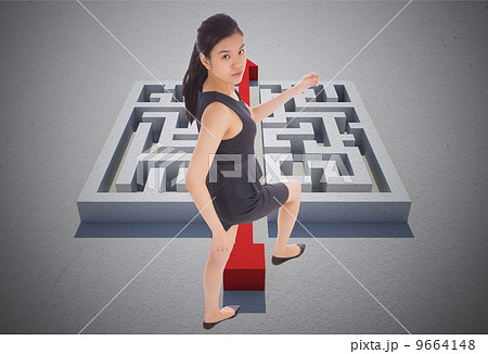 Composite image of businesswoman stepping up Composite image of businesswoman stepping up 9664148