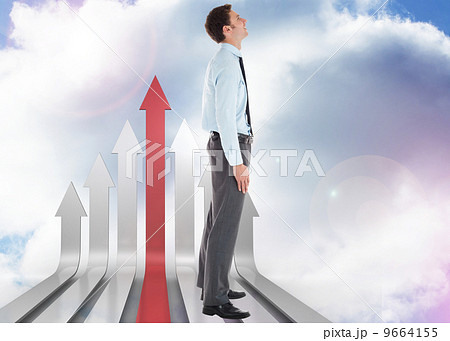Composite image of smiling businessman standing with hand in poc Composite image of smiling businessman standing with hand in poc 9664155