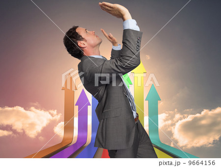 Composite image of businessman standing with arms pressing up Composite image of businessman standing with arms pressing up 9664156