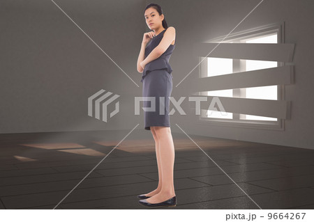 Composite image of thinking asian businesswoman 9664267