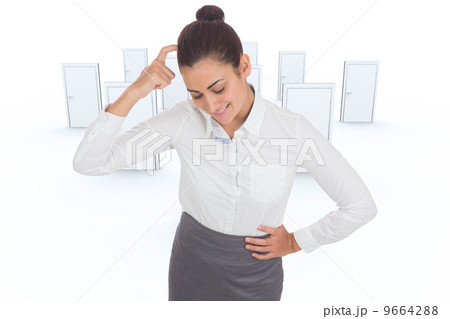 Composite image of smiling thoughtful businesswoman 9664288
