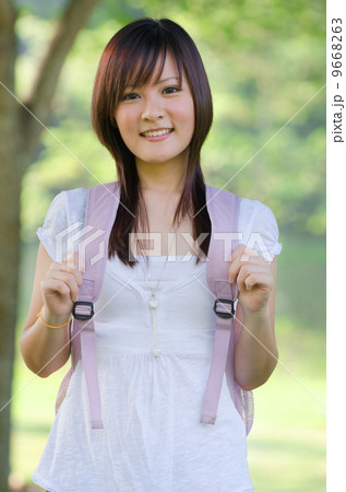 A portrait of a asian chinese race college student at campus 9668263